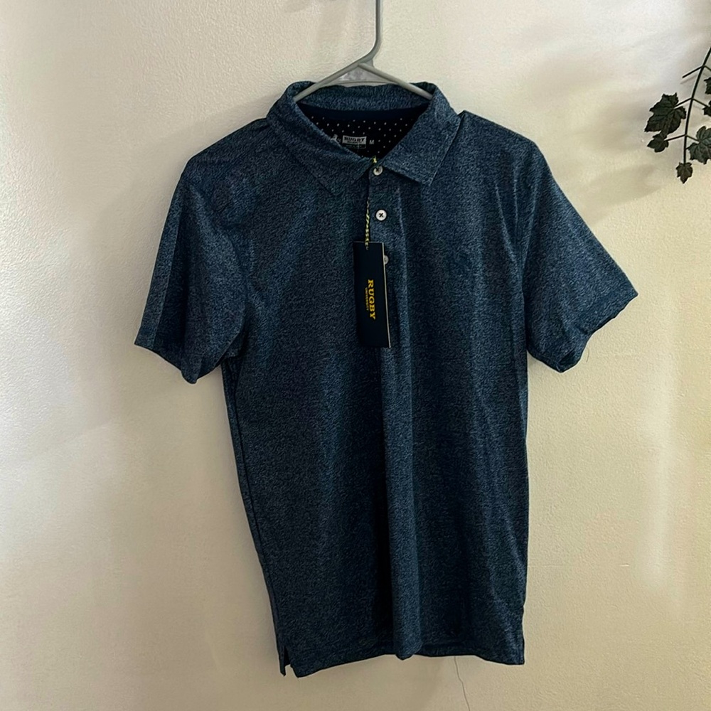 Bought this cute navy polo shirt! Put it didn’t fit - Picture 1 of 5